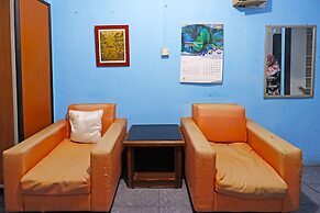 SPOT ON 91591 Rafika Homestay SyariahNearTempat Makan Pagi Sore Nohil