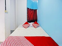 SPOT ON 91591 Rafika Homestay SyariahNearTempat Makan Pagi Sore Nohil