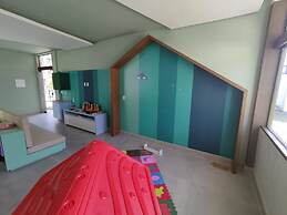 Mana & Makia Slin Muro Alto