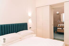 Four - Acanfora Suites