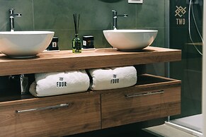 Four - Acanfora Suites