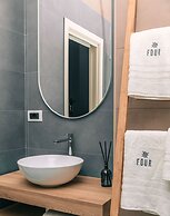 Four - Acanfora Suites