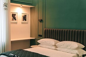 Four - Acanfora Suites