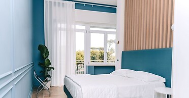 Four - Acanfora Suites