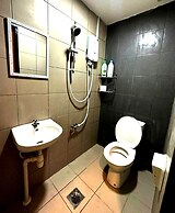 SPOT ON 90777 Aiman Room