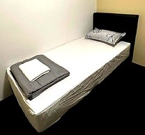 SPOT ON 90777 Aiman Room