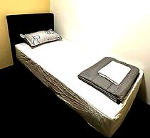 SPOT ON 90777 Aiman Room