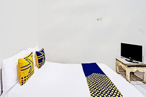 OYO 92078 Tarlo Guest House 4