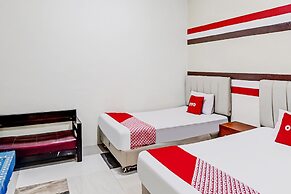 OYO 90980 Al Karim Syariah