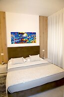 Lo Studio di viale Lo Re Camere & Caffè