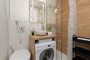 Aleja Jana Pawla II Studio by Renters