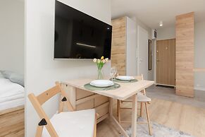 Aleja Jana Pawla II Studio by Renters