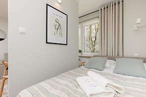 Aleja Jana Pawla II Studio by Renters