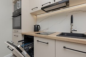 Aleja Jana Pawla II Studio by Renters