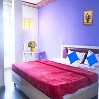 Roomshala 021 Hotel Joyous Inn