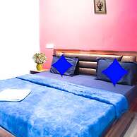 Roomshala 021 Hotel Joyous Inn