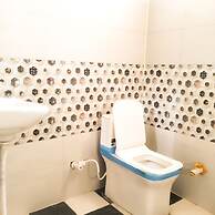 Roomshala 021 Hotel Joyous Inn