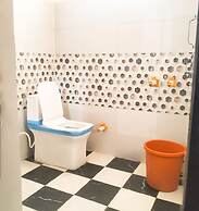 Roomshala 021 Hotel Joyous Inn