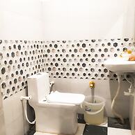 Roomshala 021 Hotel Joyous Inn