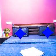 Roomshala 021 Hotel Joyous Inn