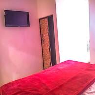 Roomshala 021 Hotel Joyous Inn