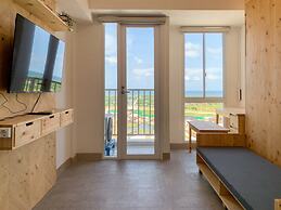 Minimalist Studio Room At Tokyo Riverside Pik 2 Apartment