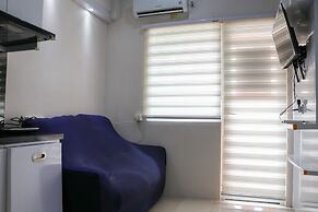 Modern 2Br Green Pramuka City Apartment Near Shopping Center