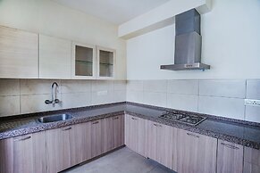 FabHotel Home Tree Service Apartment