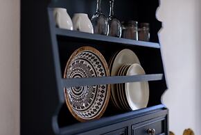 Firalia, Casa In Rock Suites