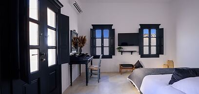 Firalia, Casa In Rock Suites