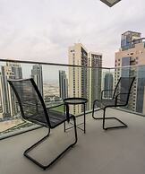 Aya - Elegant 1BR Apartment With Balcony and Creek Views