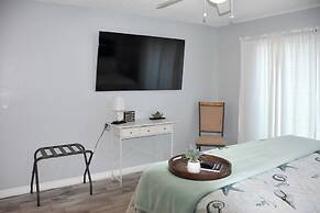 Lanai & Pond at Tranquil Bradenton Retreat!