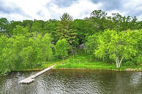 Lakefront Cabin w/ Fire Pit, Dock, & Boat Rental