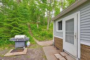 Lakefront Cabin w/ Fire Pit, Dock, & Boat Rental