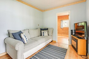 Lakefront Cabin w/ Fire Pit, Dock, & Boat Rental