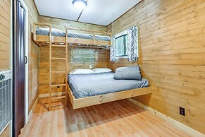 Lakefront Cabin w/ Fire Pit, Dock, & Boat Rental
