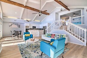 Sunny Lakefront Escape w/ Private Beach & Deck