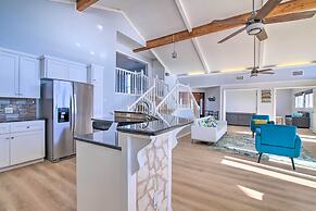 Sunny Lakefront Escape w/ Private Beach & Deck