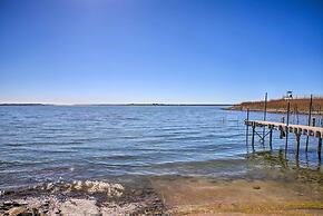 Sunny Lakefront Escape w/ Private Beach & Deck