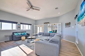 Sunny Lakefront Escape w/ Private Beach & Deck