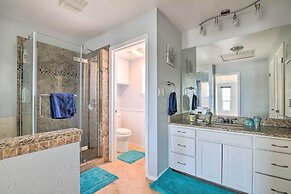 Sunny Lakefront Escape w/ Private Beach & Deck