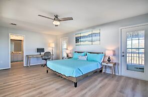 Sunny Lakefront Escape w/ Private Beach & Deck