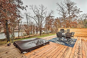Lakefront Rogers Getaway w/ Hot Tub & Deck!