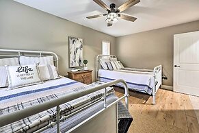 Lakefront Rogers Getaway w/ Hot Tub & Deck!