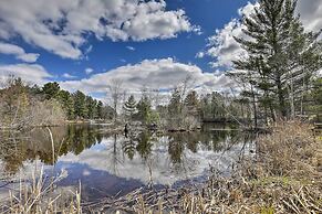 Lakeside Cabin w/ Fire Pit: Near Pine Point Park!