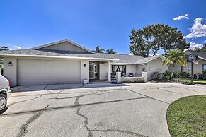 Palm Harbor Home w/ Pool & Golf Course Views!