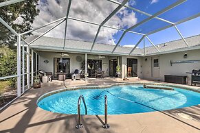 Palm Harbor Home w/ Pool & Golf Course Views!