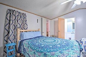 Houghton Lake Area Home w/ Fire Pit & Yard!