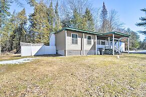 Houghton Lake Area Home w/ Fire Pit & Yard!
