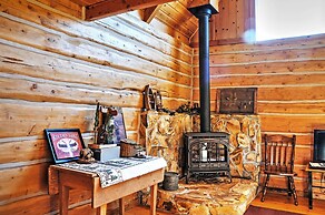 Remote Antimony Log Cabin w/ Green Meadow Views!